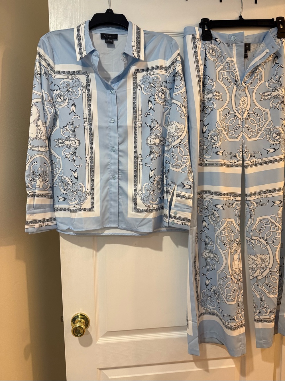Gracia women’s two piece pants set. Top is a medium and pants a large.